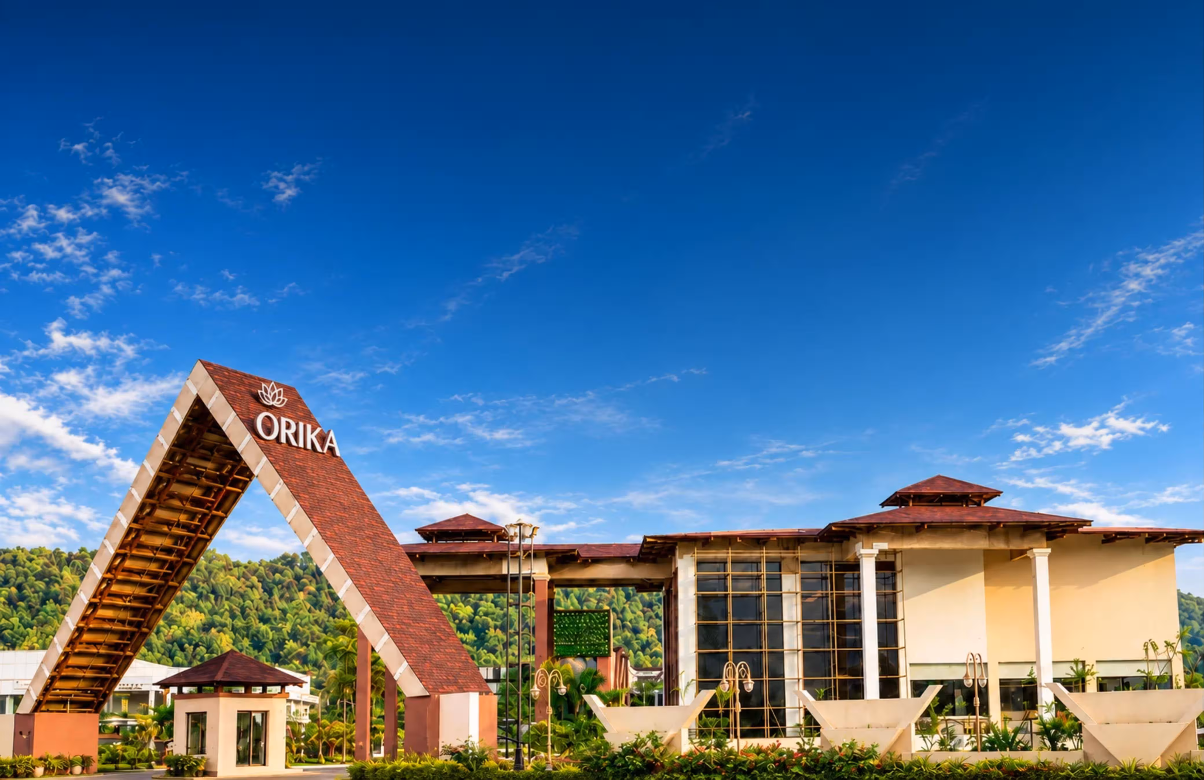 The entrance of Orika Club, Jabalpur, under a deep blue sky